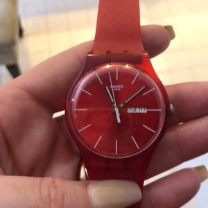 Red rubber swatch watch